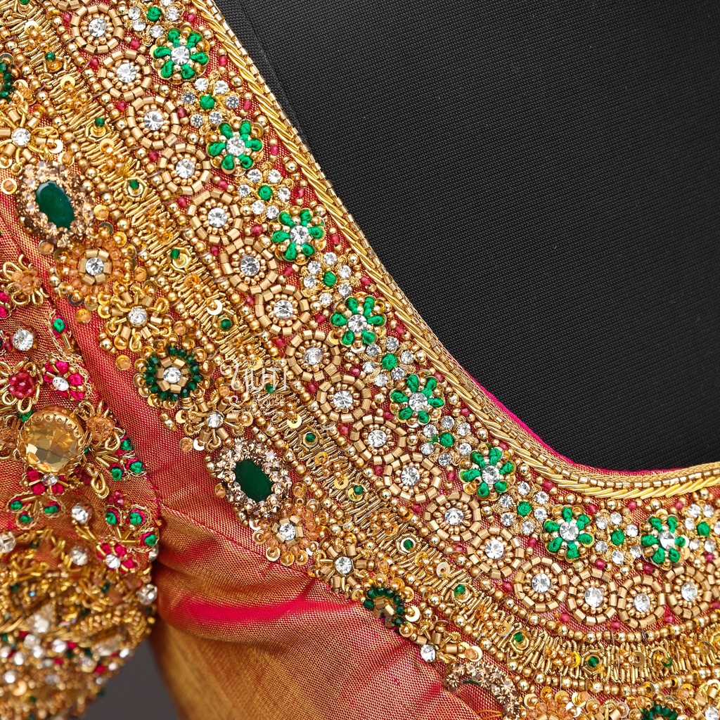 Orange-colored masterpiece of bridal blouse