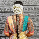 The allure of blue embroidery on bridal blouse