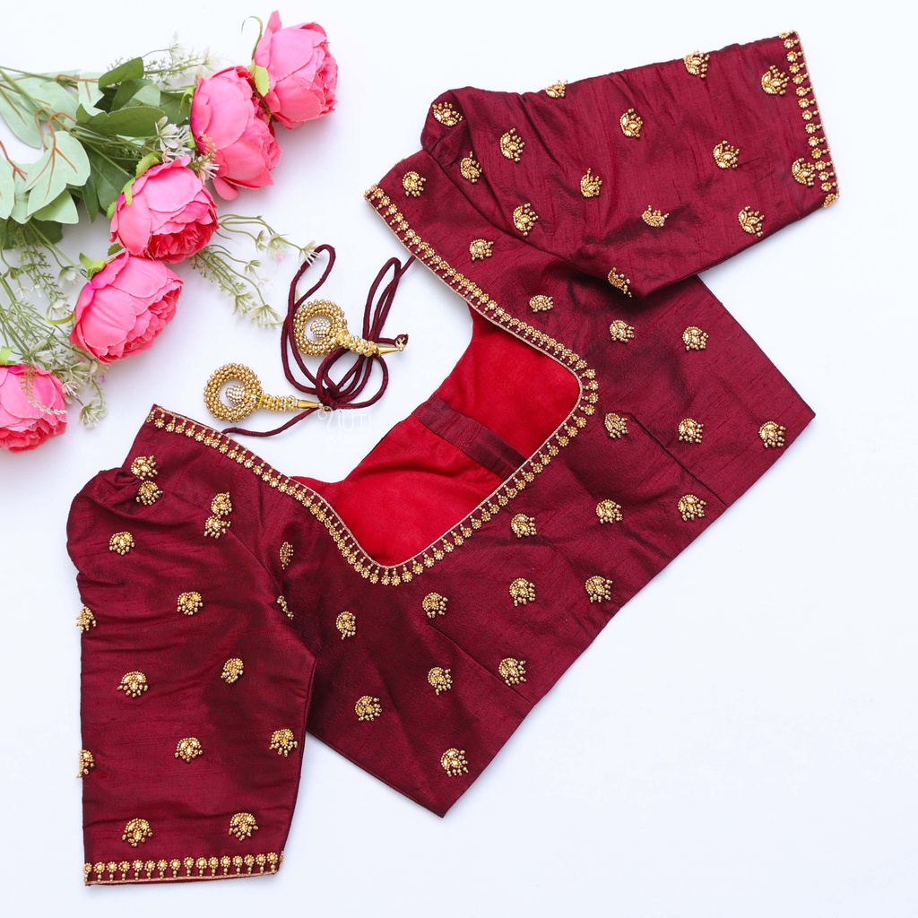 Elegant and chic in this wine red embroidery blouse