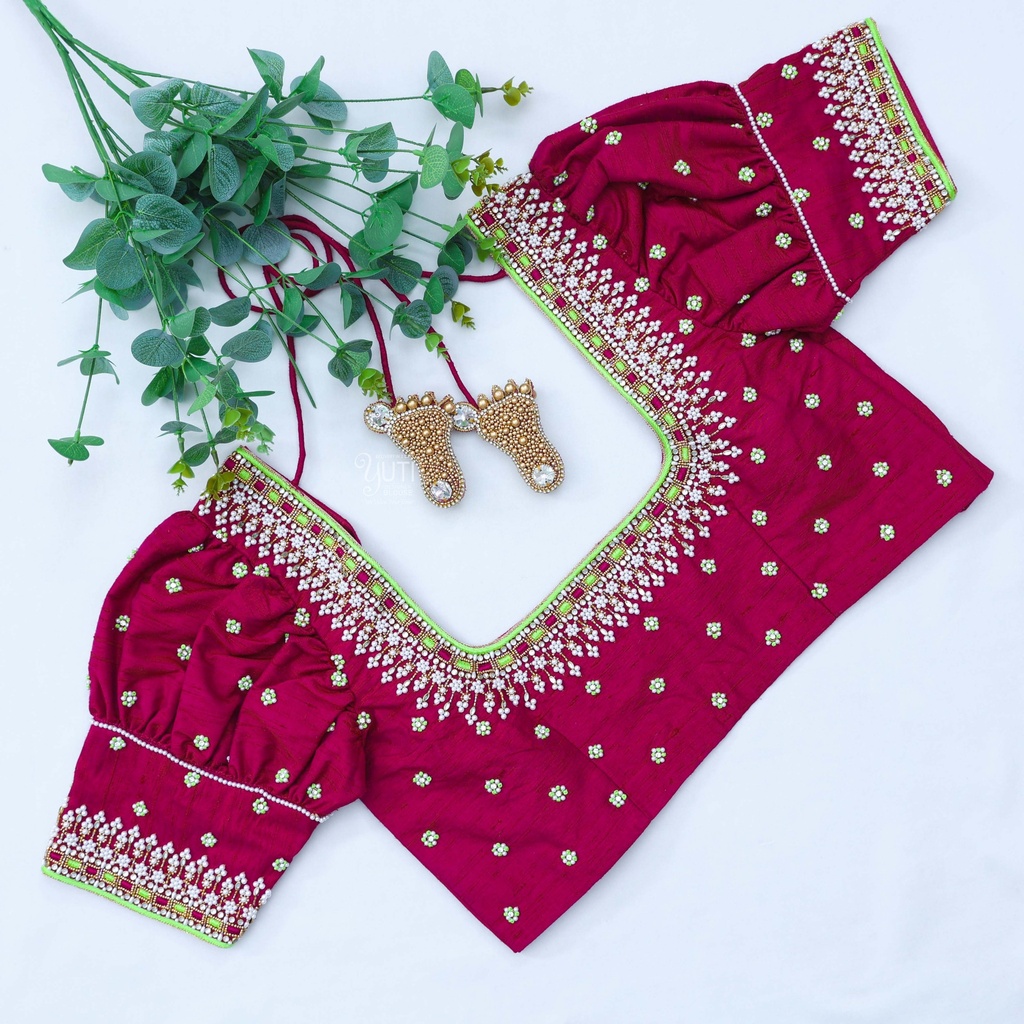 "Feeling powerful and stylish in my new purple red aari work blouse!