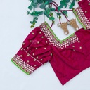 "Feeling powerful and stylish in my new purple red aari work blouse!