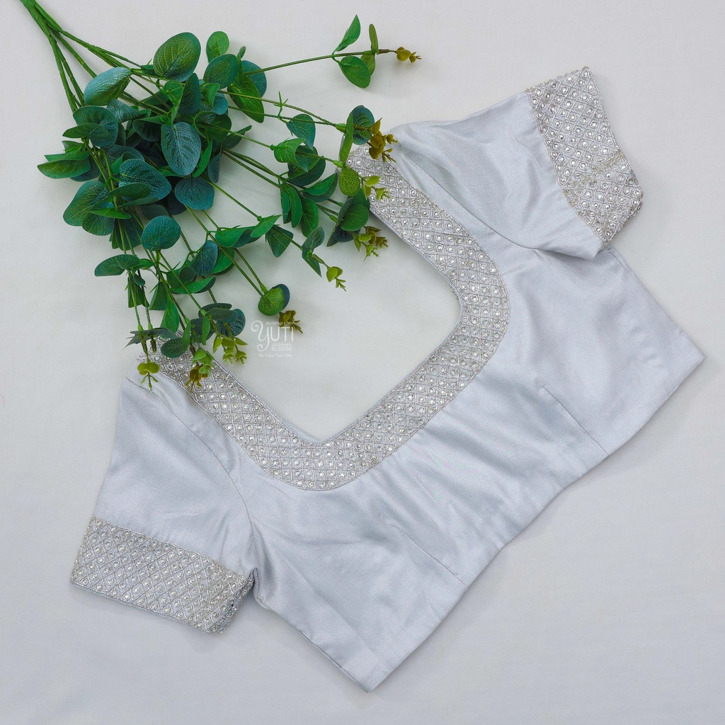 Adding a touch of elegant sophistication to this lace bodice with our new Metallic Silver embroidery.