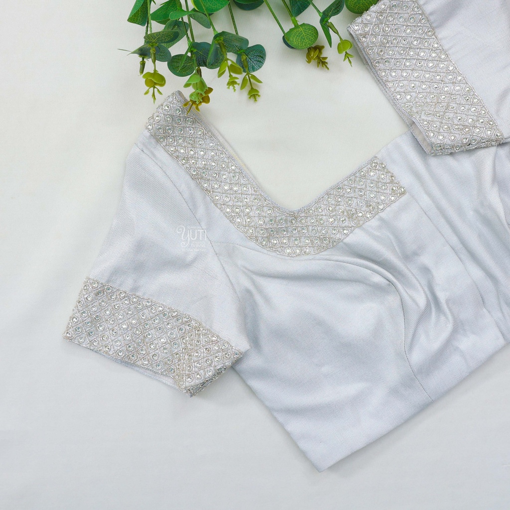 Adding a touch of elegant sophistication to this lace bodice with our new Metallic Silver embroidery.