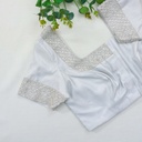 Adding a touch of elegant sophistication to this lace bodice with our new Metallic Silver embroidery.