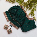 Featuring intricate green color embroidery bridal blouse