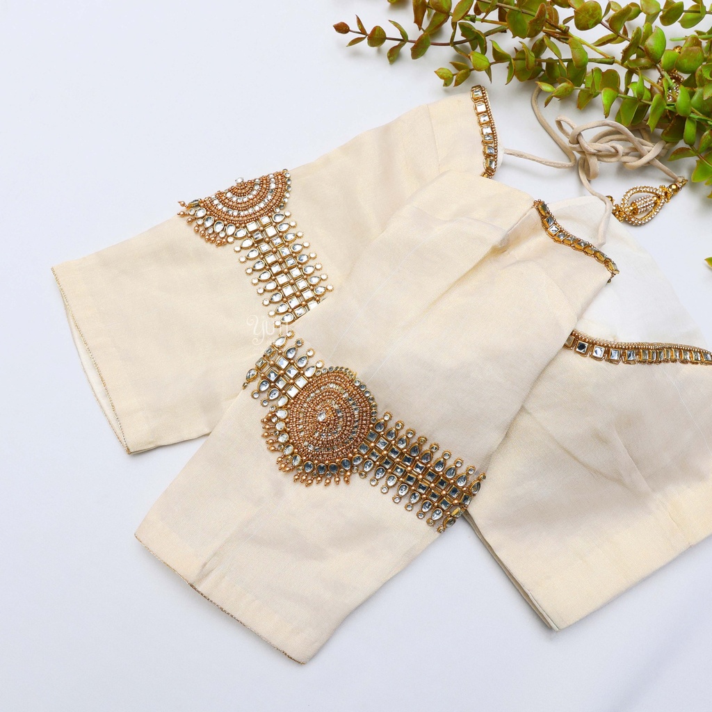Intricately embroidered blouses in beautiful sandel hues.