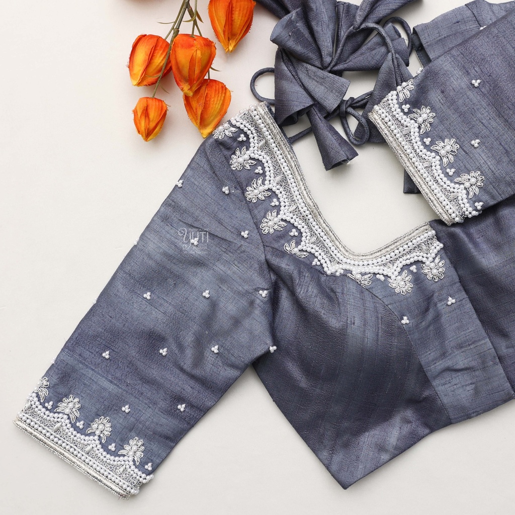 Stunning dark blue blouse adorned with elegant white shade embroidery