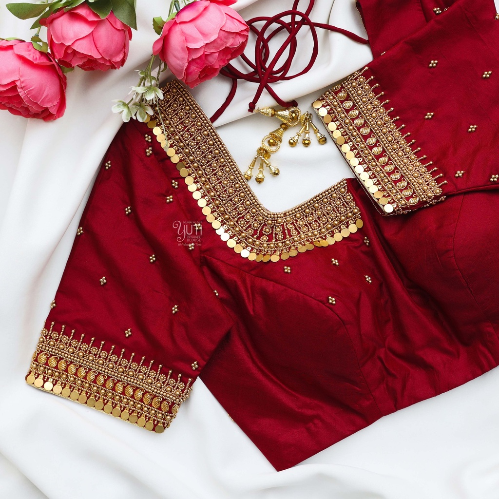 stunning red bridal blouse designs with intricate gold embroidery