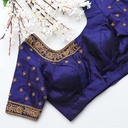 the perfect dark blue bridal blouse with stunning golden embroidery work