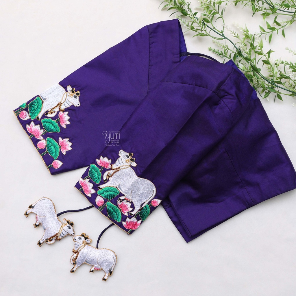 Dark blue bridal blouses featuring stunning cow hand embroidery design.