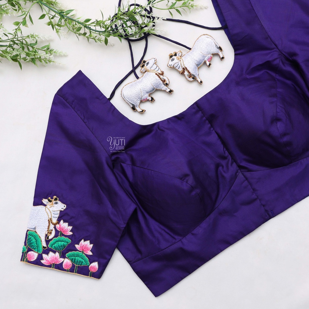 Dark blue bridal blouses featuring stunning cow hand embroidery design.