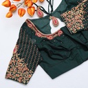 Step into the spotlight with a dark green Aari bridal blouse that exudes grace and charm: