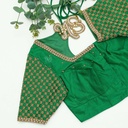 Fashionable in this shamrock green designer blouse
