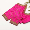 The world of bridal fashion with this vibrant neon pink blouse