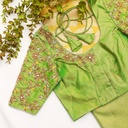Elevate your style with our Greenish Beige embroidery blouse, the epitome of timeless elegance.