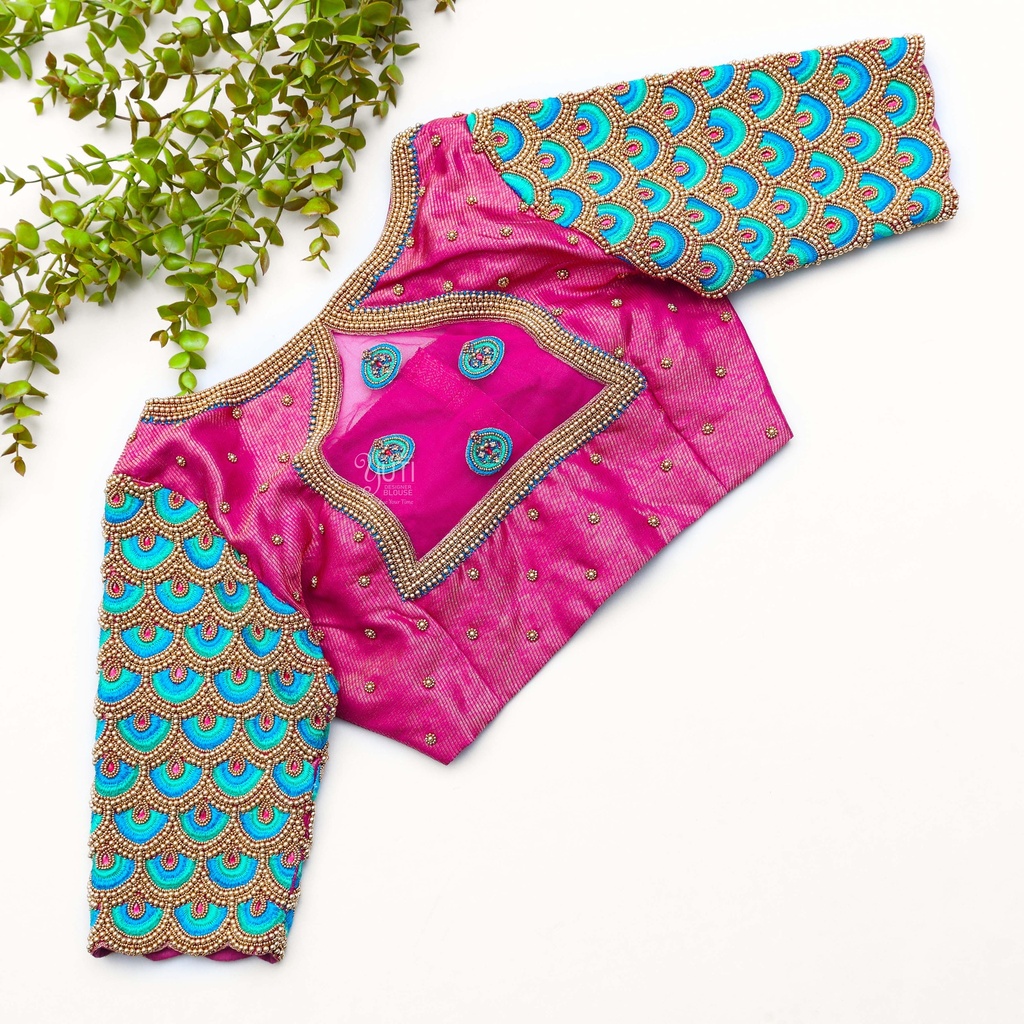 Discover the perfect blend of vibrant color and intricate embroidery that adds a touch of sophistication to any ensemble