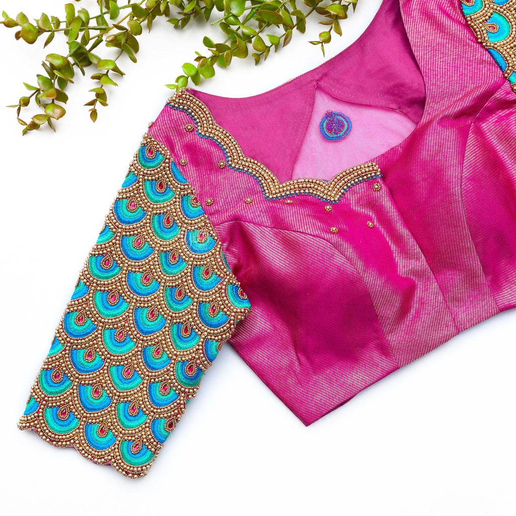 Discover the perfect blend of vibrant color and intricate embroidery that adds a touch of sophistication to any ensemble