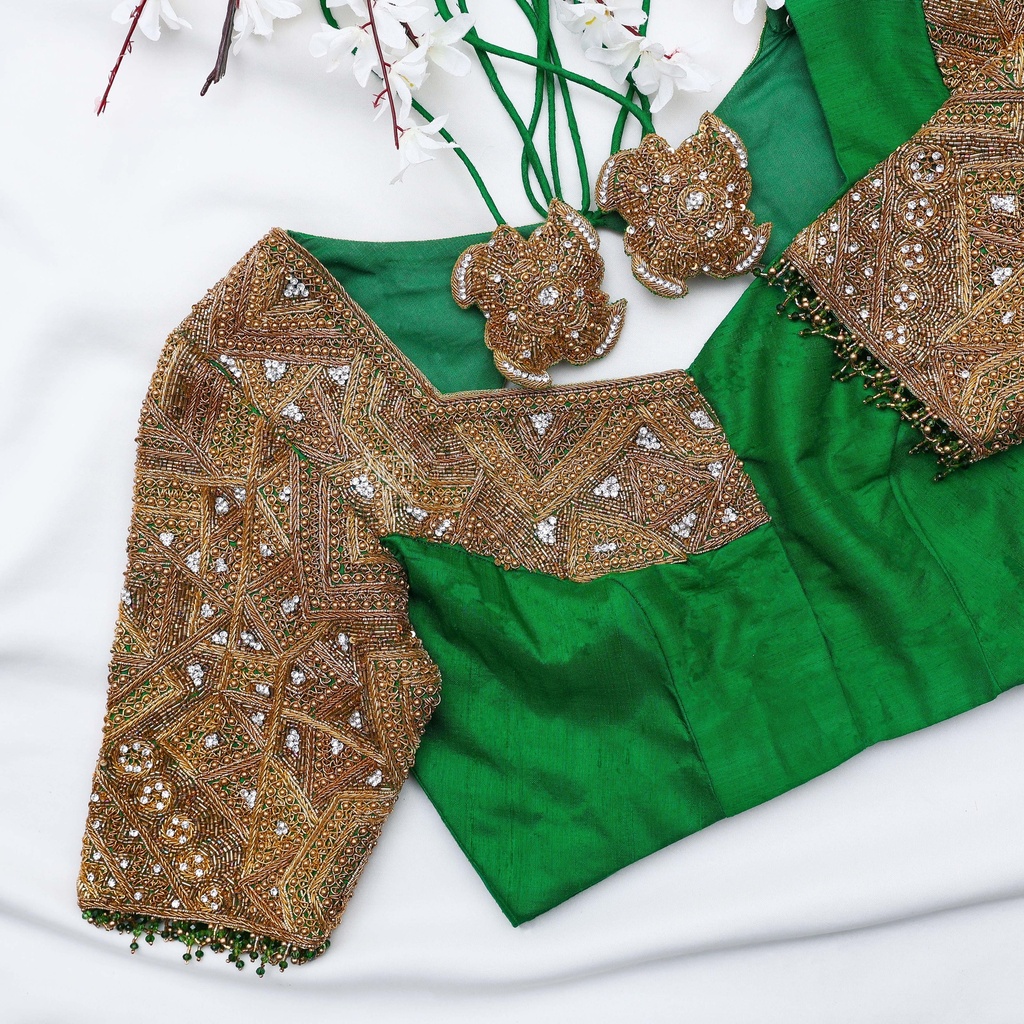 Embroidered meticulously by skilled artisans, every detail on this blouse tells a story of craftsmanship and artistry.