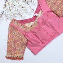Feeling pretty in this light pink designer blouse