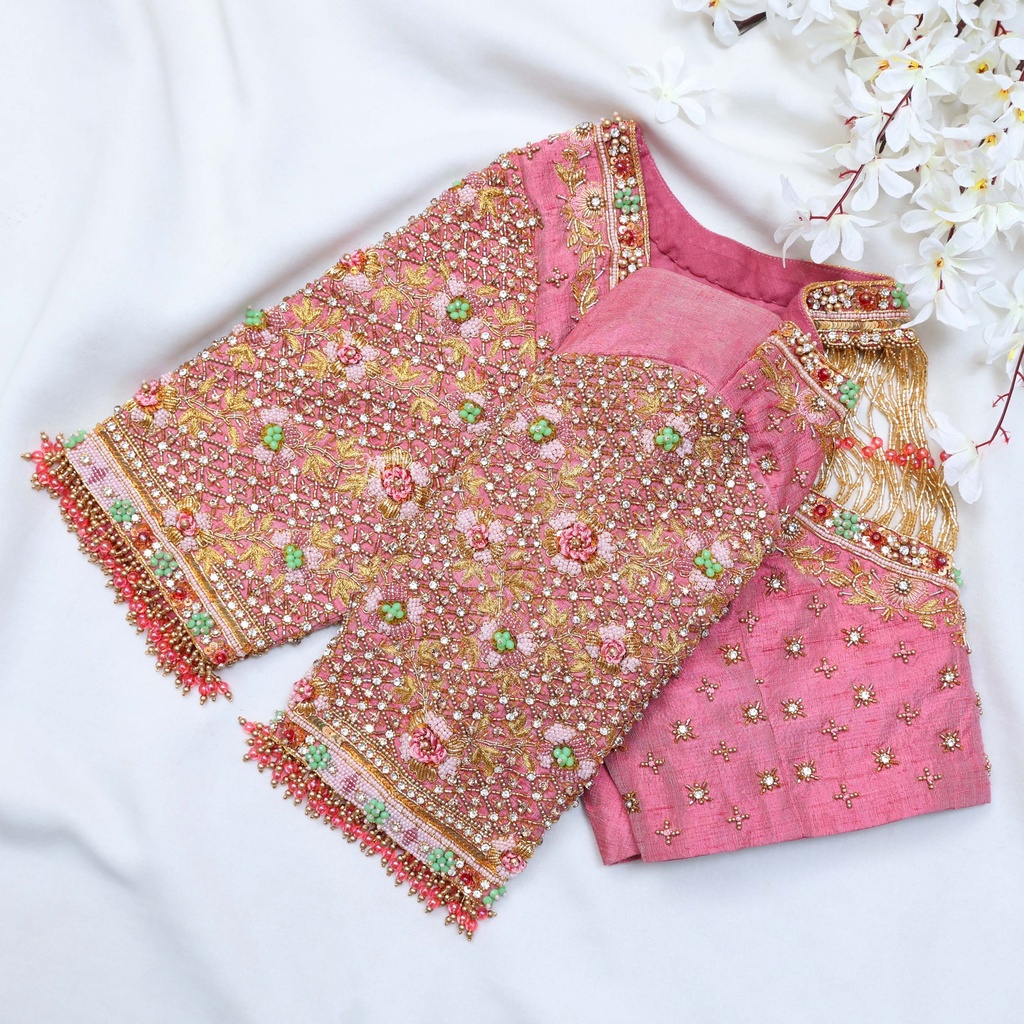 Feeling pretty in this light pink designer blouse