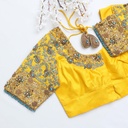 Step up your style game with this captivating yellow embroidery blouse