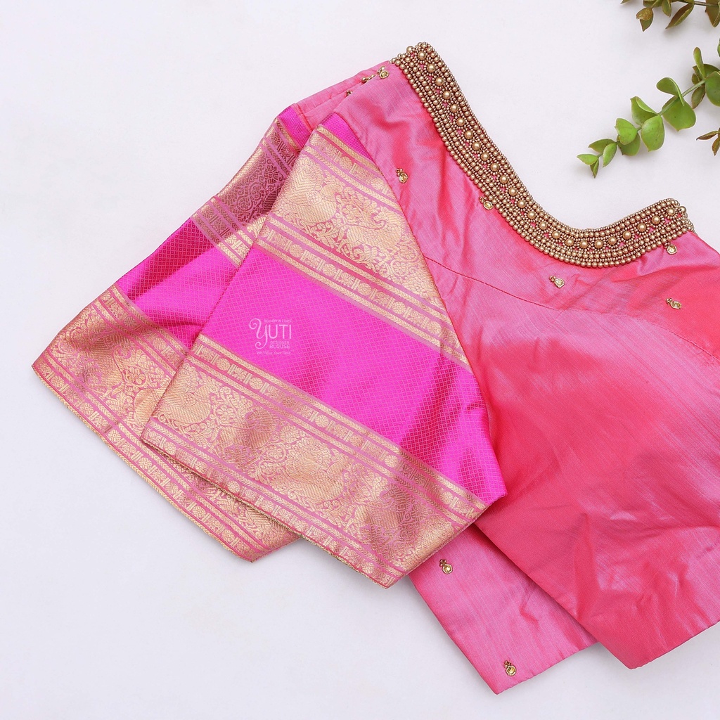Feeling pretty in this elegant light pink designer blouse