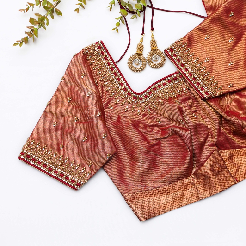 Beauty of traditional craftsmanship with orange blouse