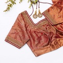 Beauty of traditional craftsmanship with orange blouse