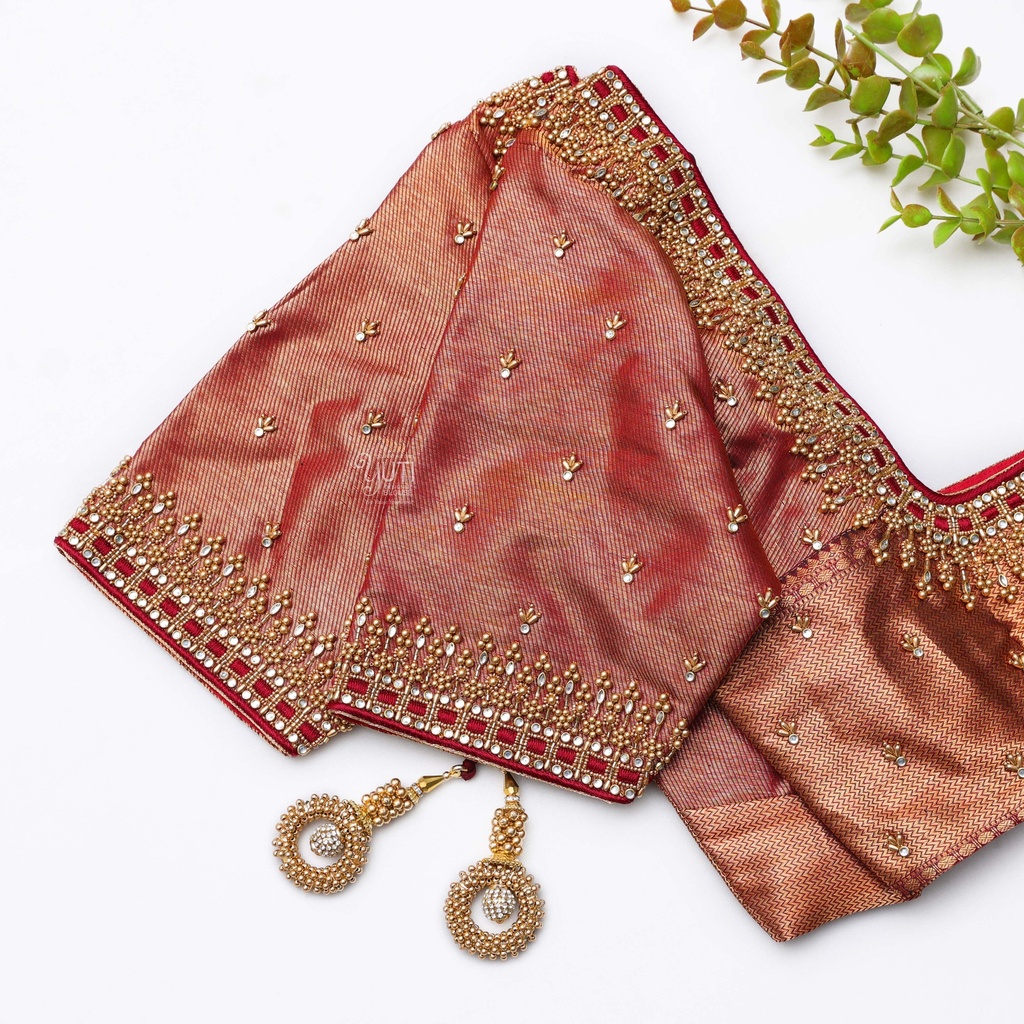 Beauty of traditional craftsmanship with orange blouse