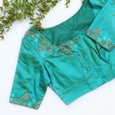 Embrace the beauty of nature with this turquoise blue blouse