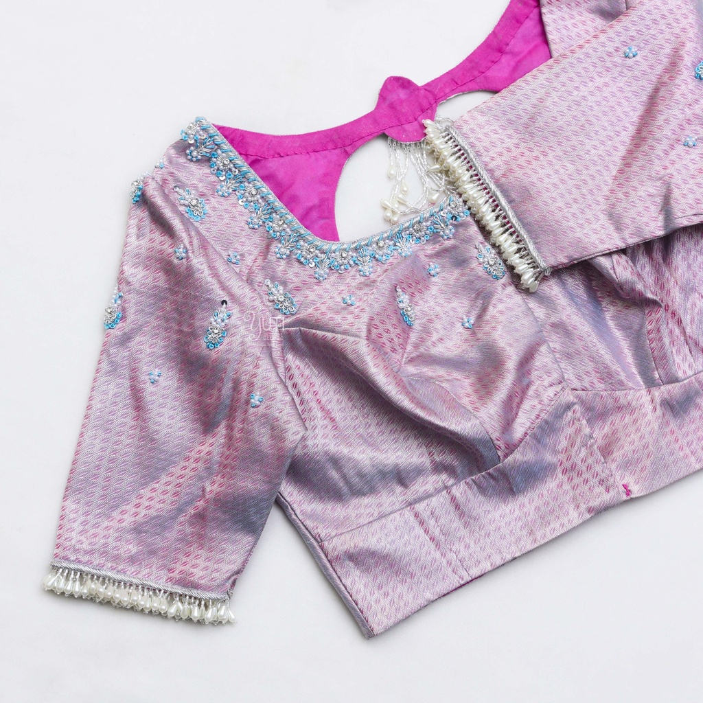 Discover the epitome of grace and style with this French Grey-inspired pink blouse