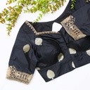 This black silk blouse adorned with intricate gold embroidery