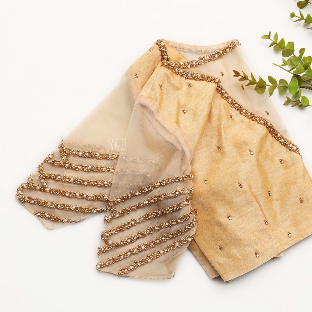 Elegance personified in this exquisite peach bridal blouse