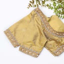 This gold embroidered blouse with beading is the perfect choice