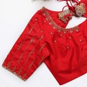 A stunning blend of red and gold, this bridal blouse