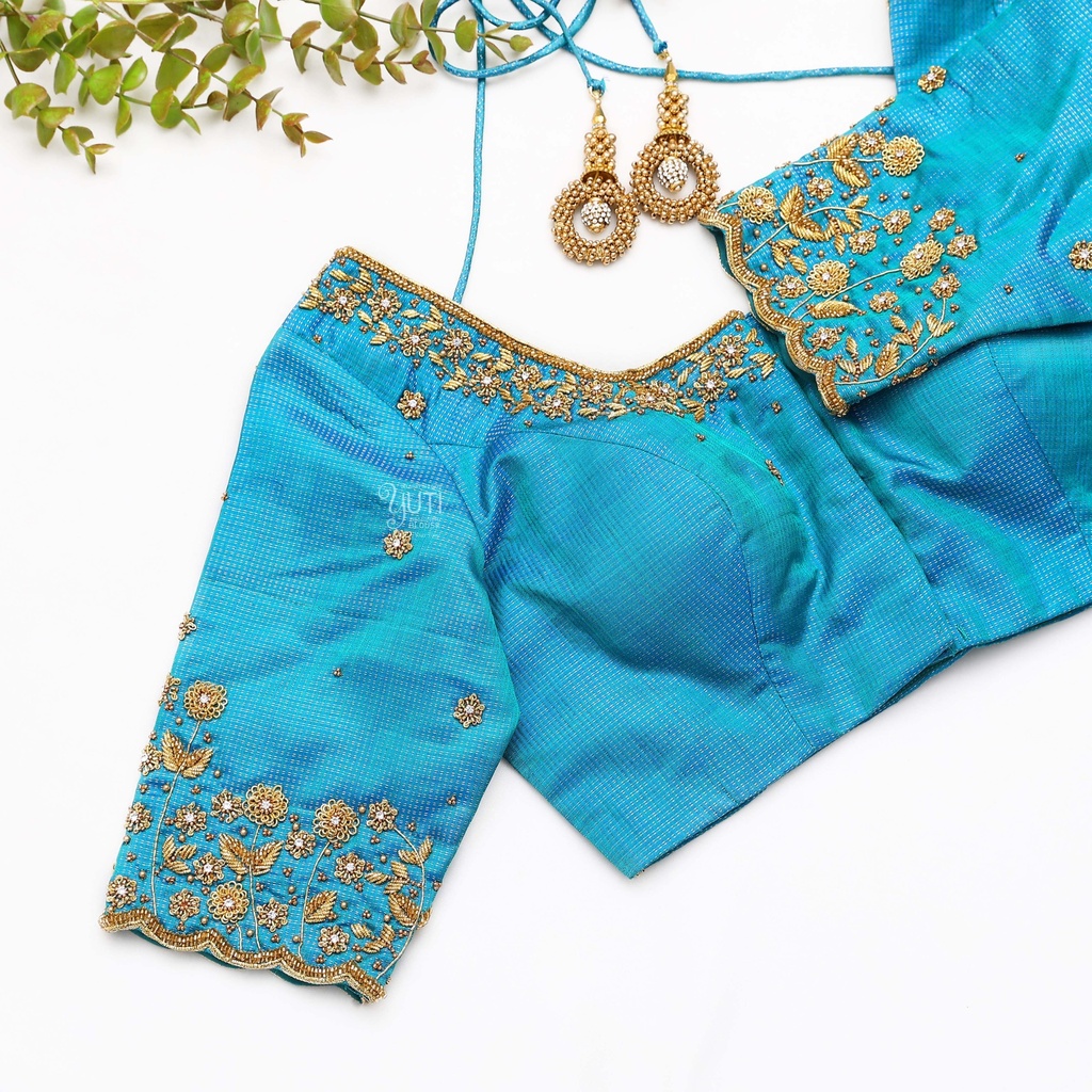 Traditional craftsmanship with this exquisite blue blouse