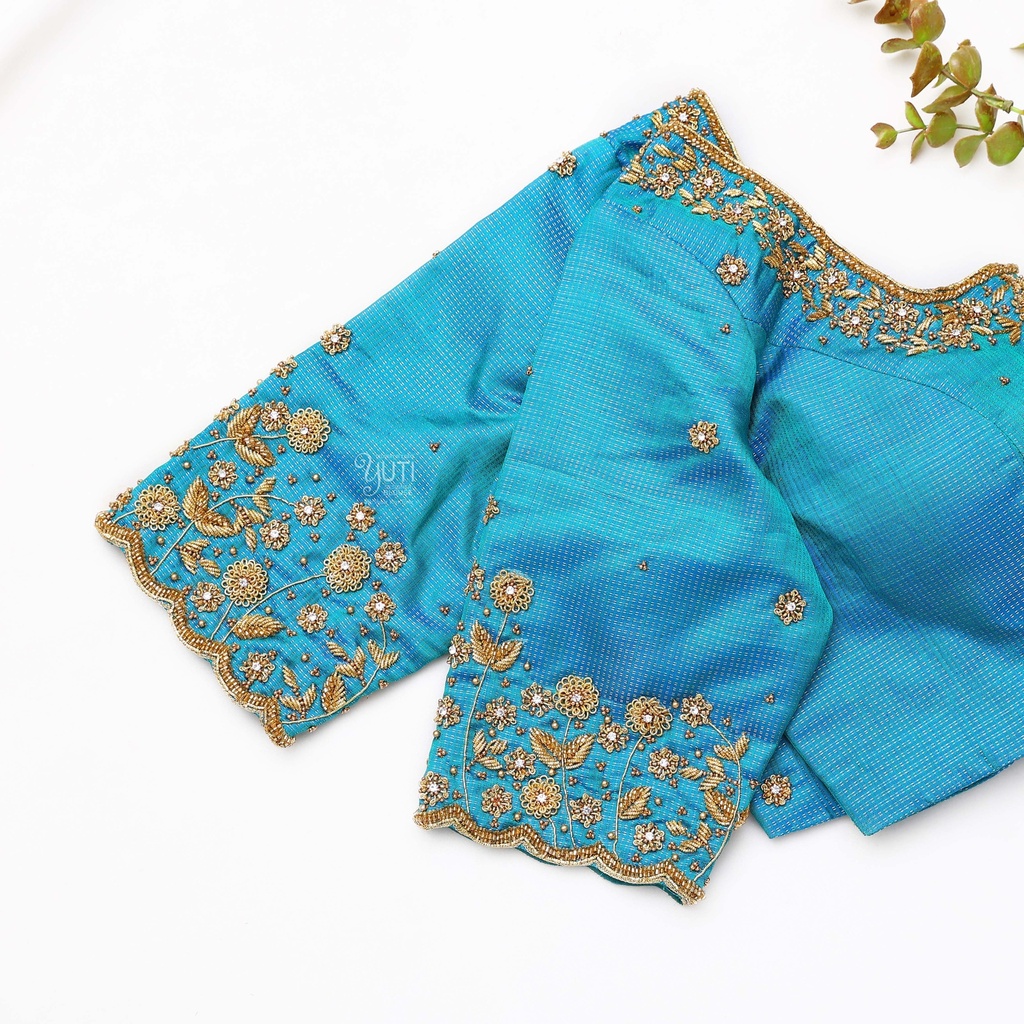 Traditional craftsmanship with this exquisite blue blouse