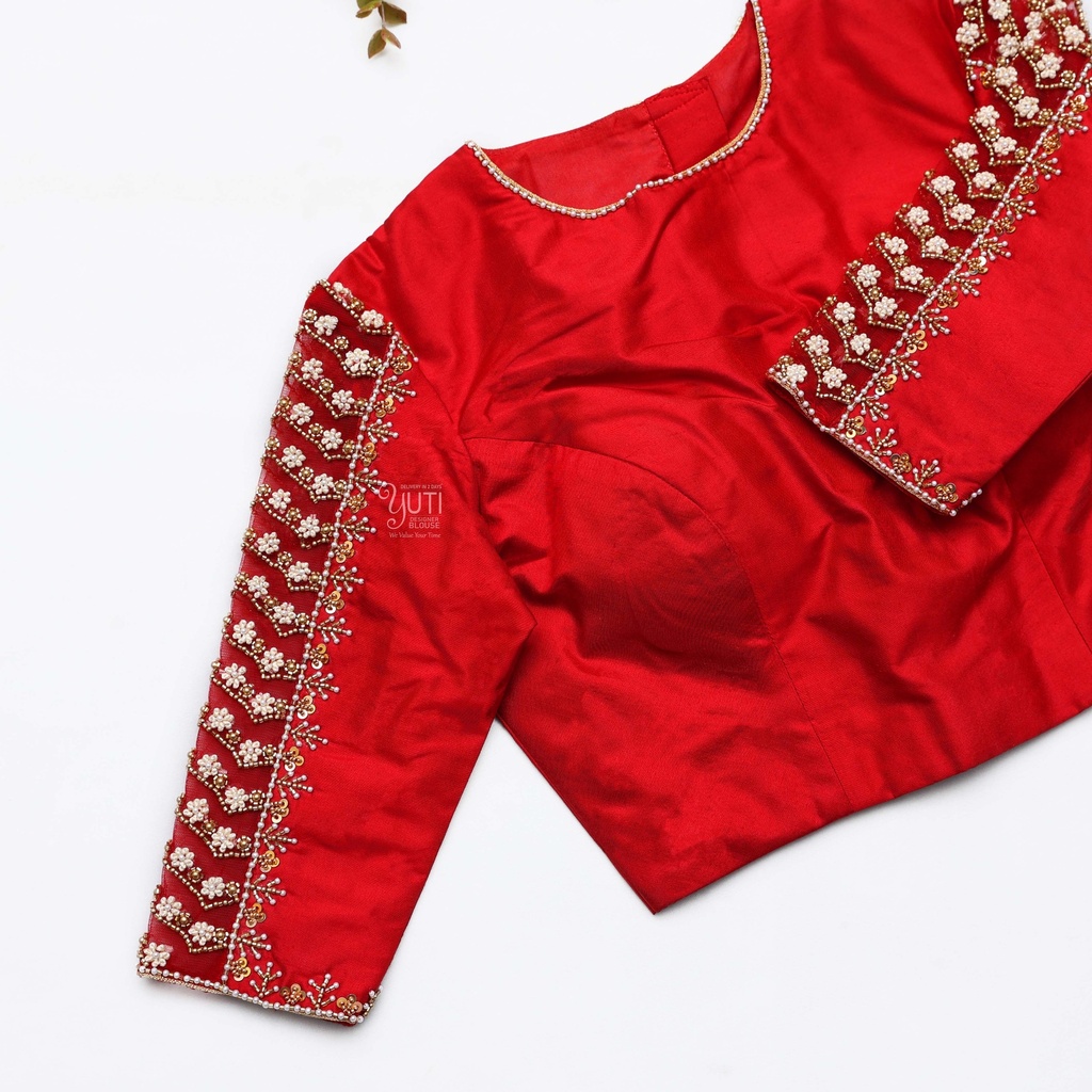 A stunning bridal blouse adorned with intricate embroidery