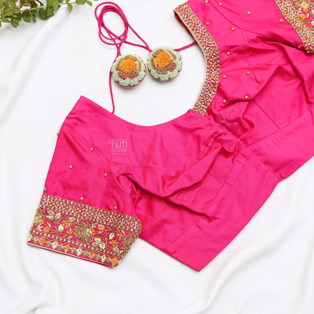 traditional Indian attire with this stunning pink embroidered Blouse