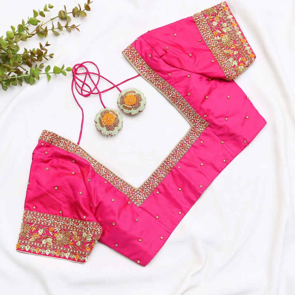 traditional Indian attire with this stunning pink embroidered Blouse