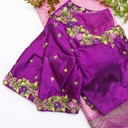 Flaunting the vibrant colors of spring with this purple blouse and its floral design.