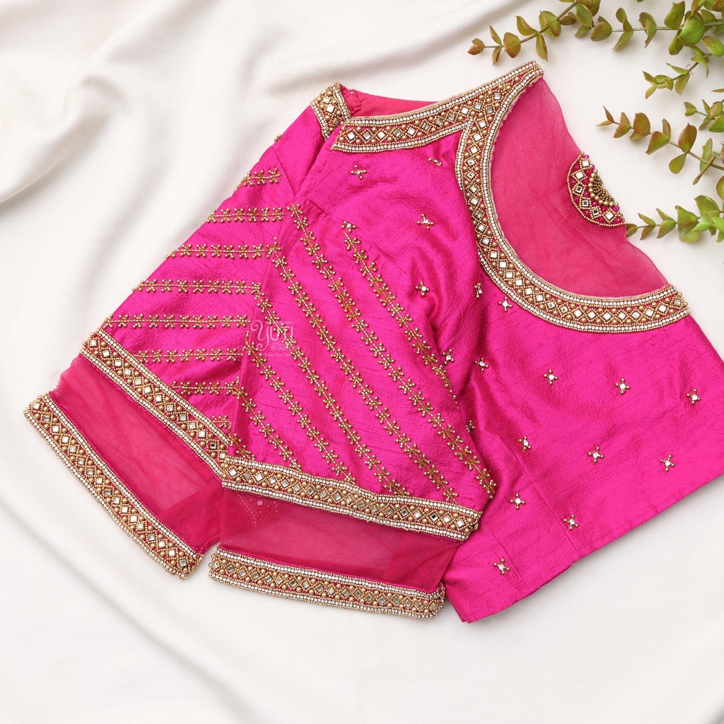 Pretty in pink . Rocking this stylish circular design blouse