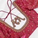 Red blouse with traditional pendant