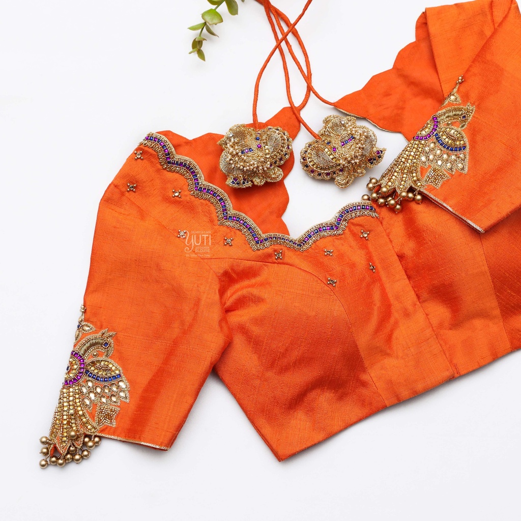 Bringing sunshine vibes with this vibrant orange blouse