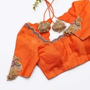 Bringing sunshine vibes with this vibrant orange blouse