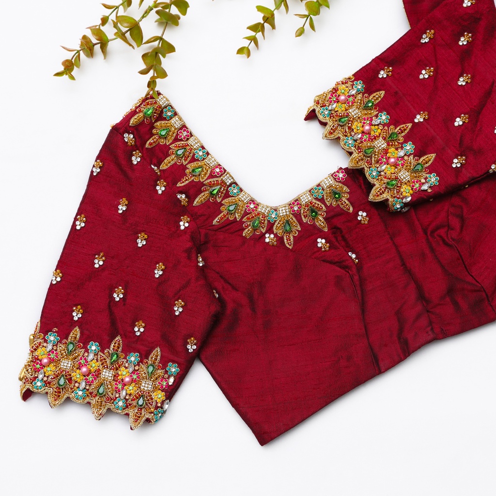 Step into elegance with this stunning red color embroidery bridal blouse!