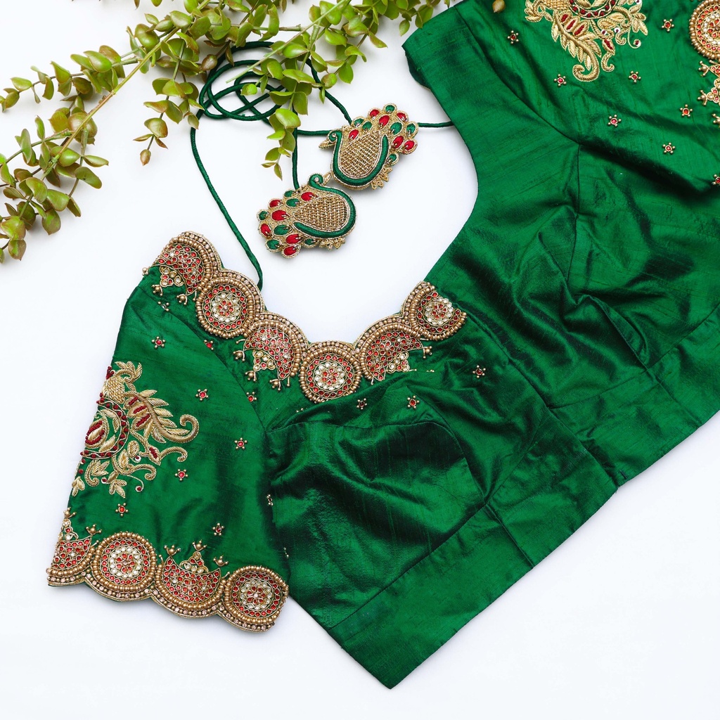 Bridal green blouse with a pair of gold embroidery work