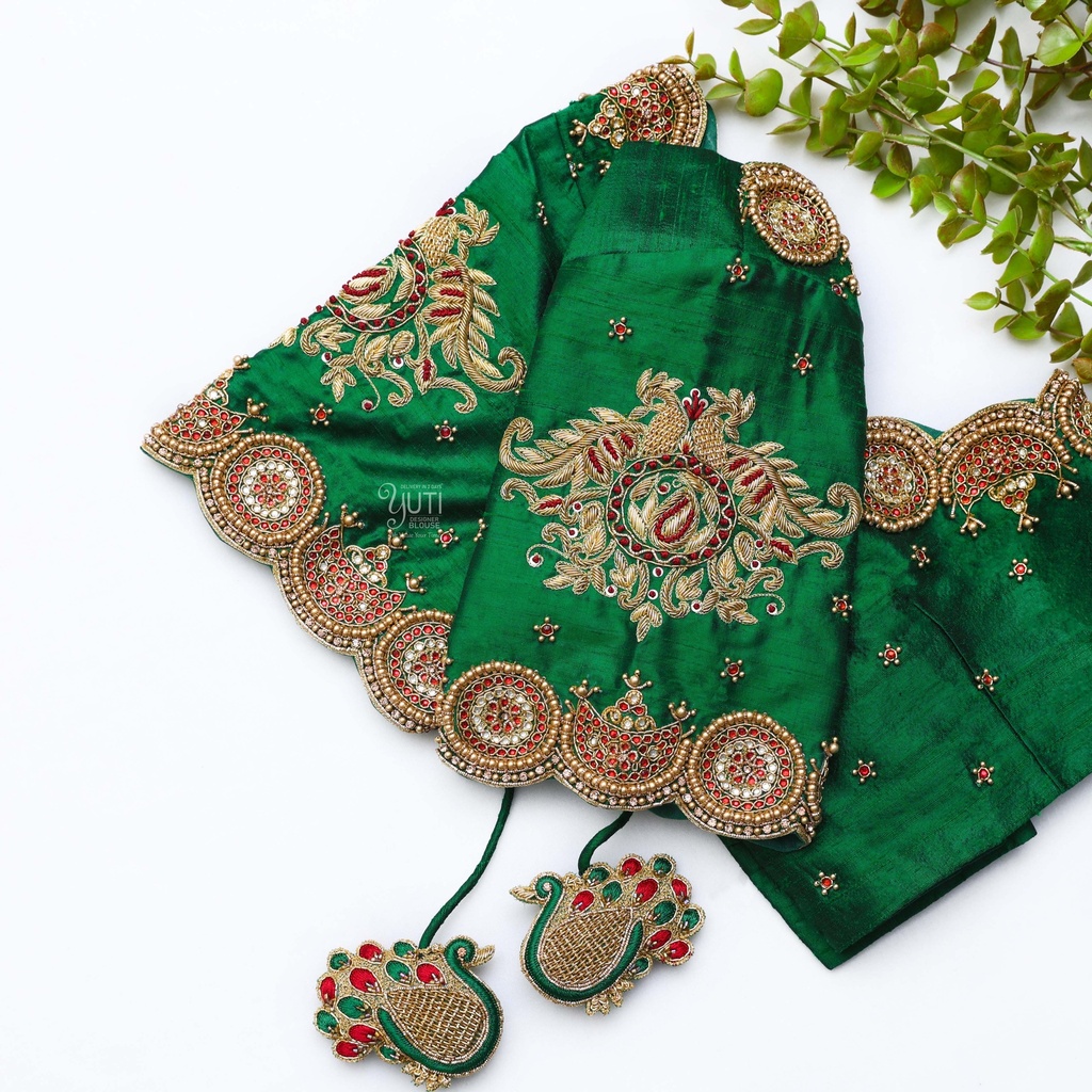 Bridal green blouse with a pair of gold embroidery work