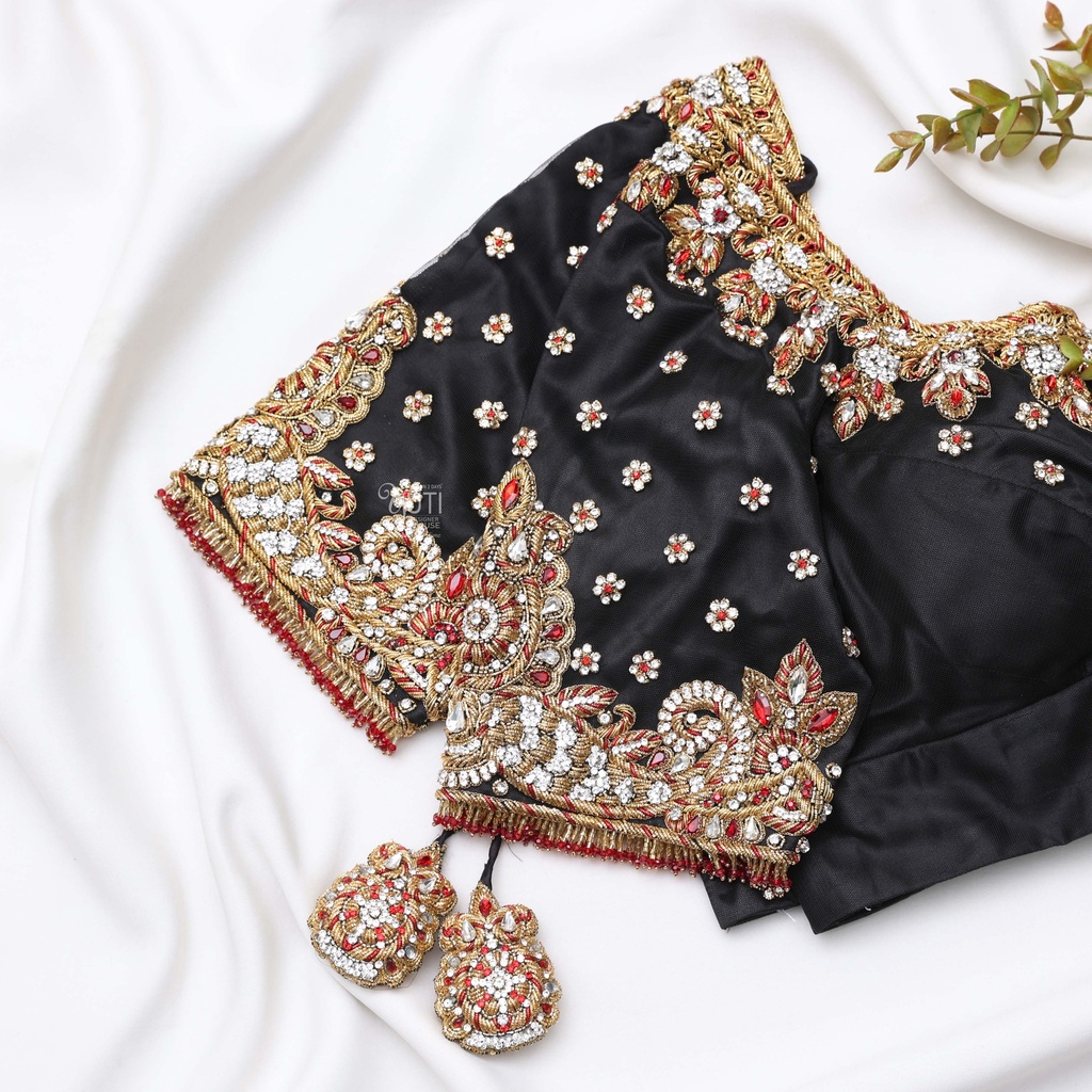Black shade bridal blouse with a golden Embroidery work