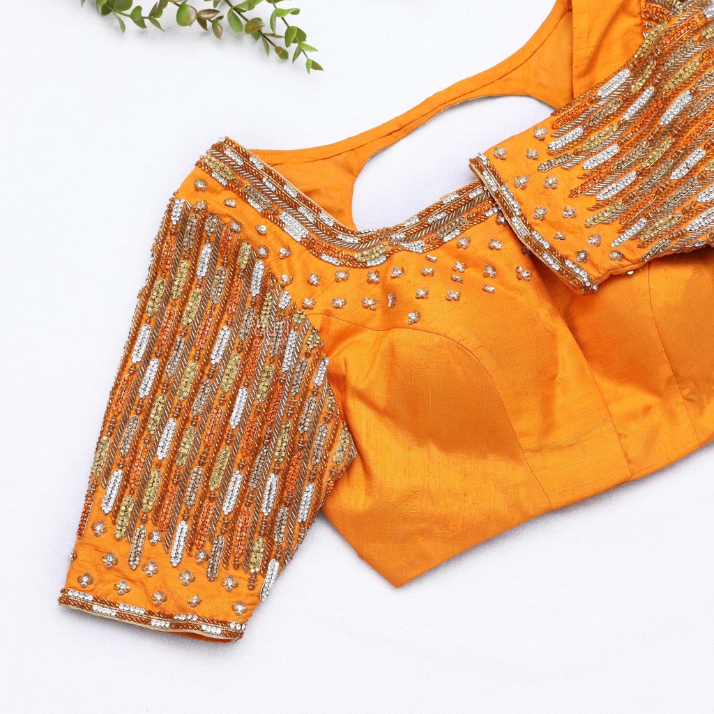 yellow blouse with a matching neck and embroidery design